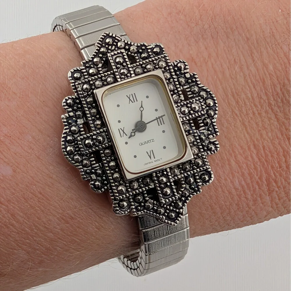 Avon silver tone